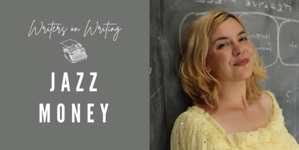 Author Jazz Money smiling against a blackboard. 